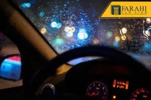Rainy windshield view from inside car