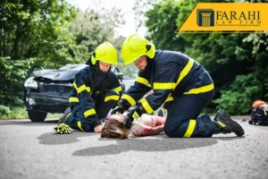 Firefighters helping car accident victim