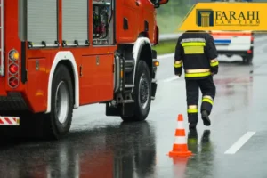 Image of a fire truck and firefighter
