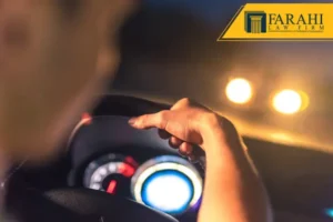 Man driving car at night.
